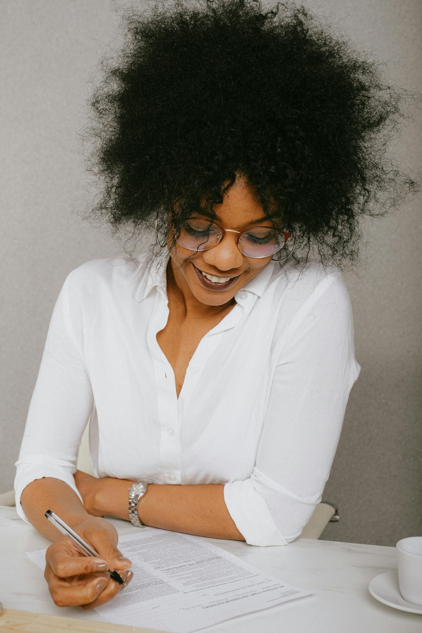 Woman In White Dress Shirt Wearing Eyeglasses